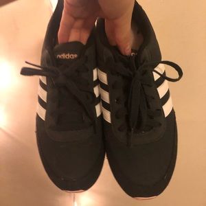 Adidas pink, black, and white sneakers